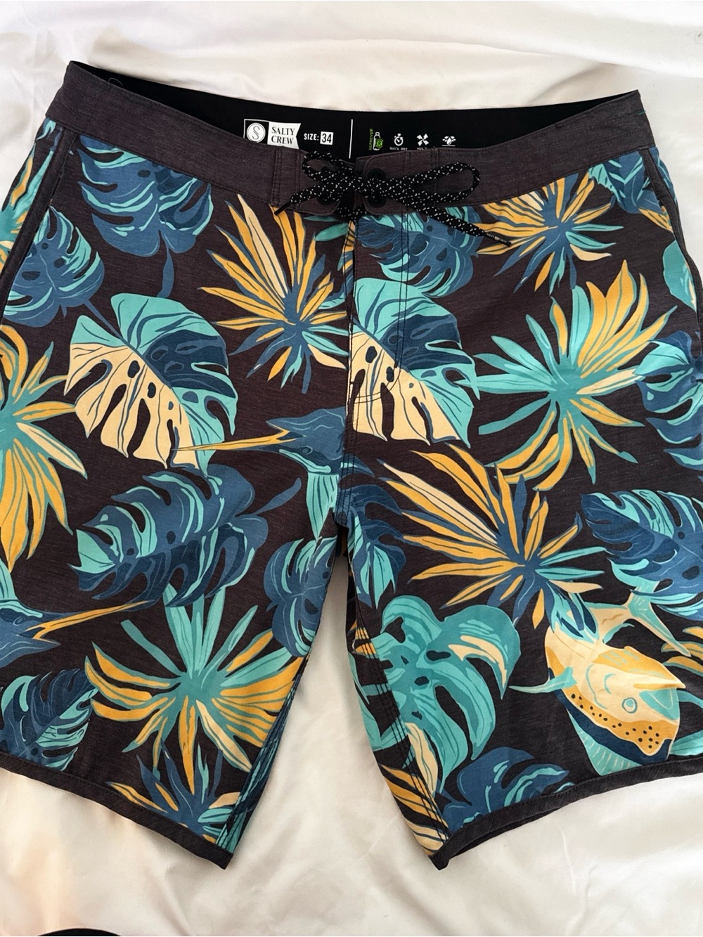 Salty Crew Men’s Black Swim Board Shorts with Teal & Yellow Tropical Print